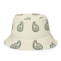 Bucket hat reversible — exterior crema con paisley verde