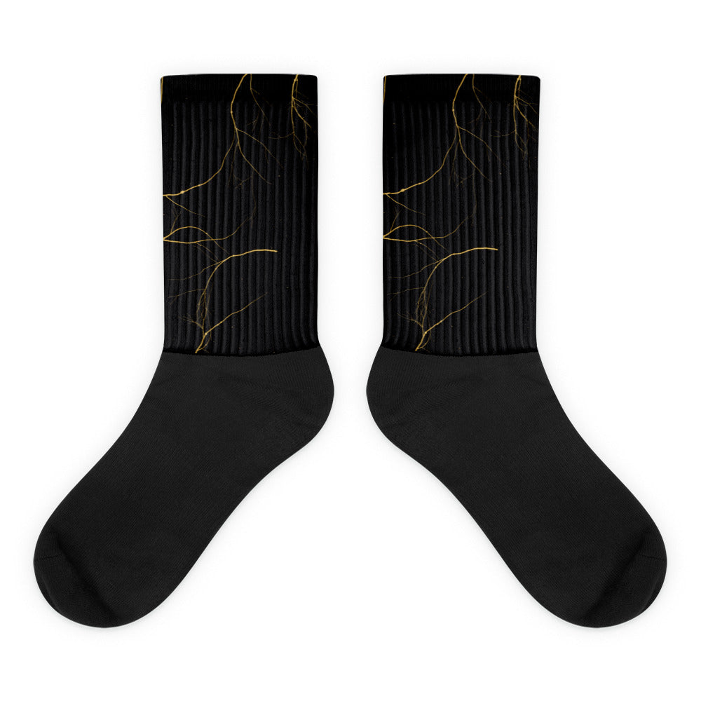 Calcetines negros sublimados con venas doradas kintsugi