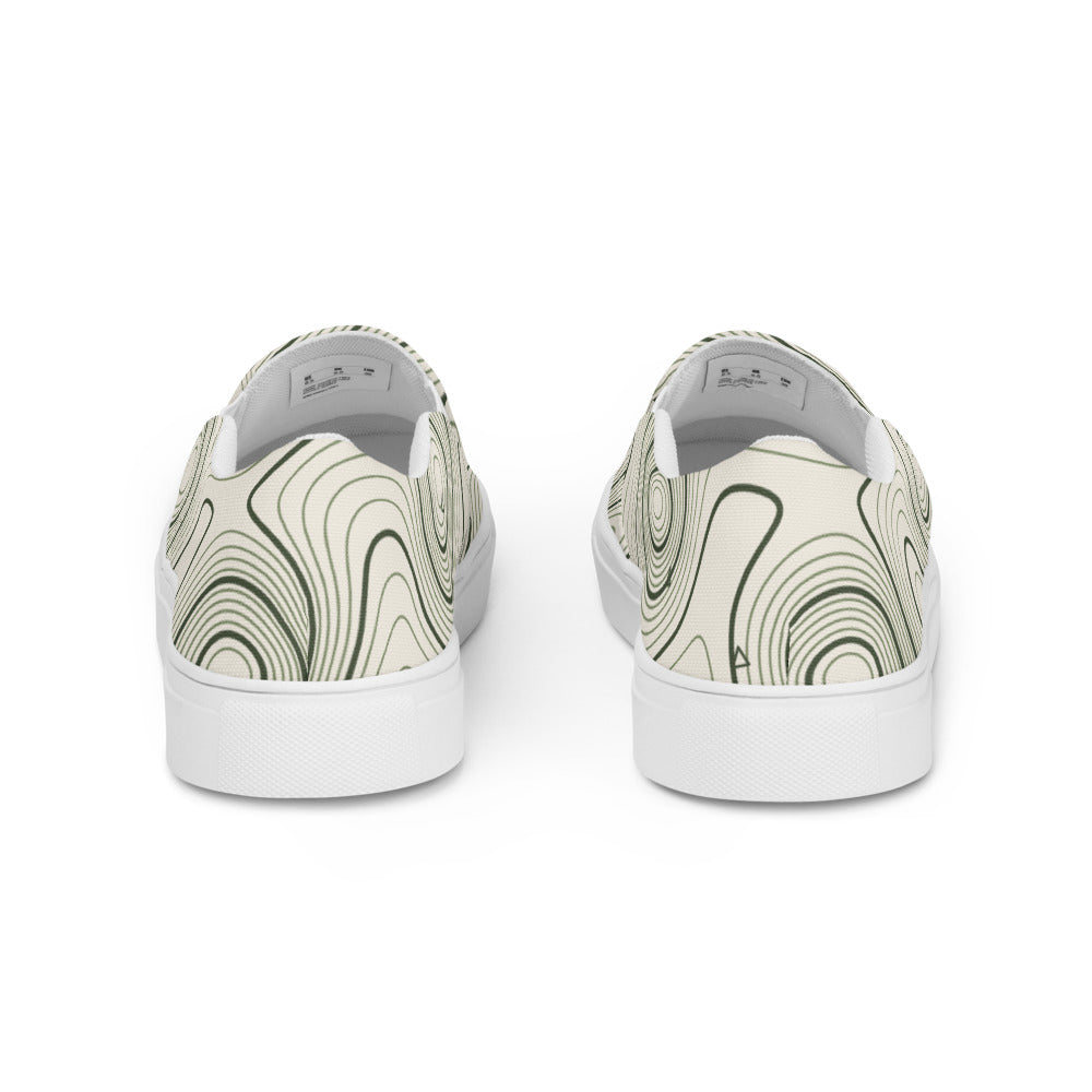 Vista trasera de las zapatillas slip-on topográficas