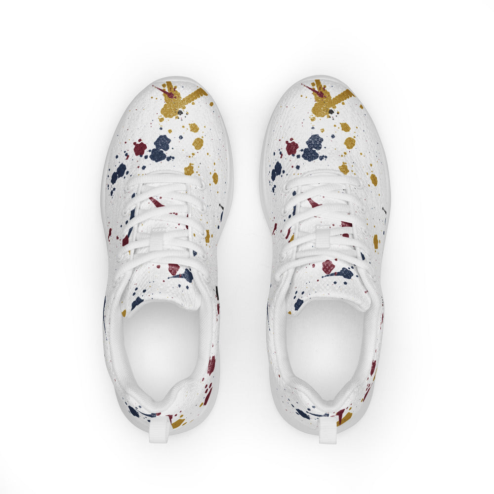 Deportivas blancas con salpicaduras de pintura multicolor